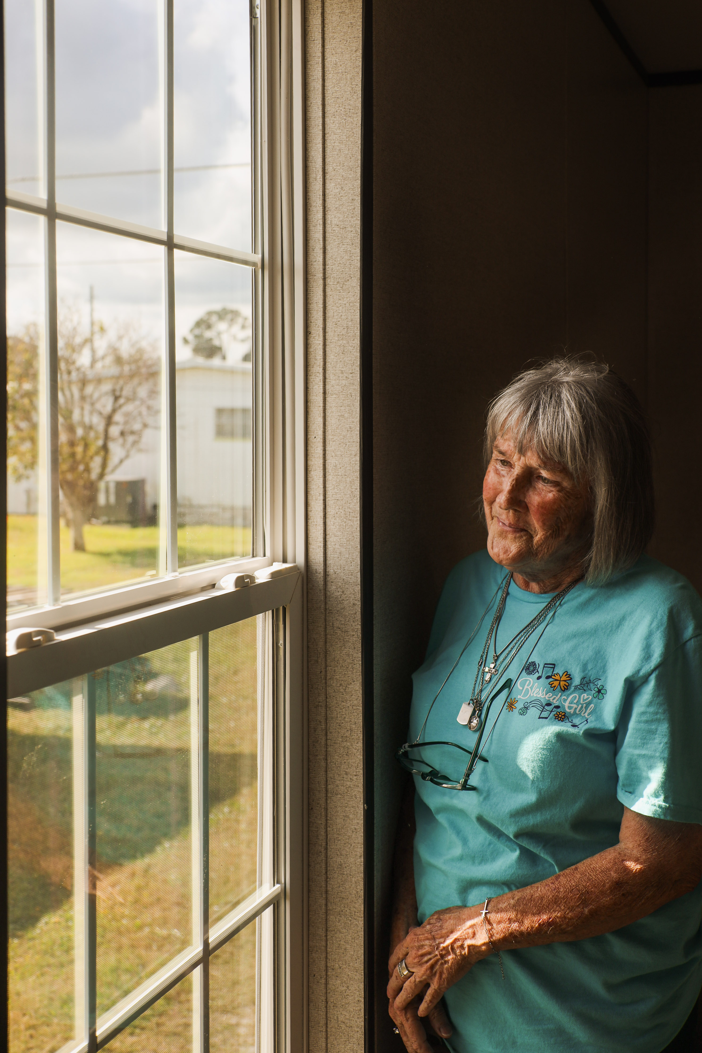 Deborah Groover looks out her window, reflecting on a new beginning.